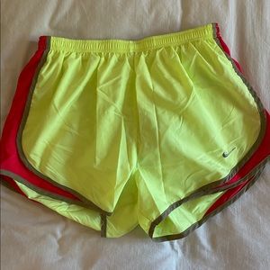 Nike yellow running shorts
